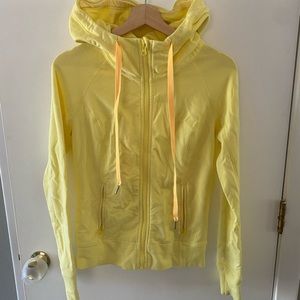 Lululemon size 6 zip up jacket with hood. Lightly worn.
